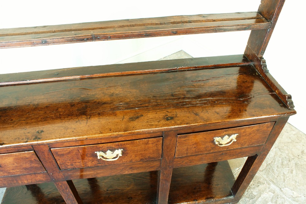 A Small Georgian Oak Potboard Dresser and Rack. View II