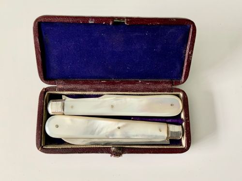 fig 1. Silver & mother of pearl folding knife and fork
