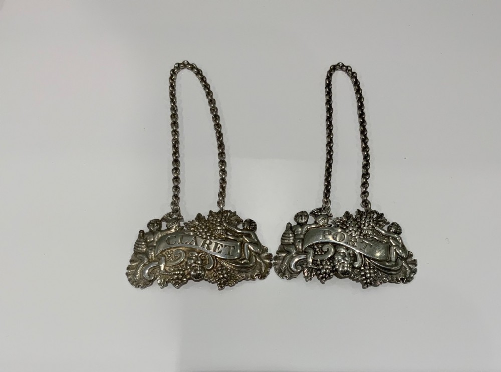 Pair of silver Georgian labels