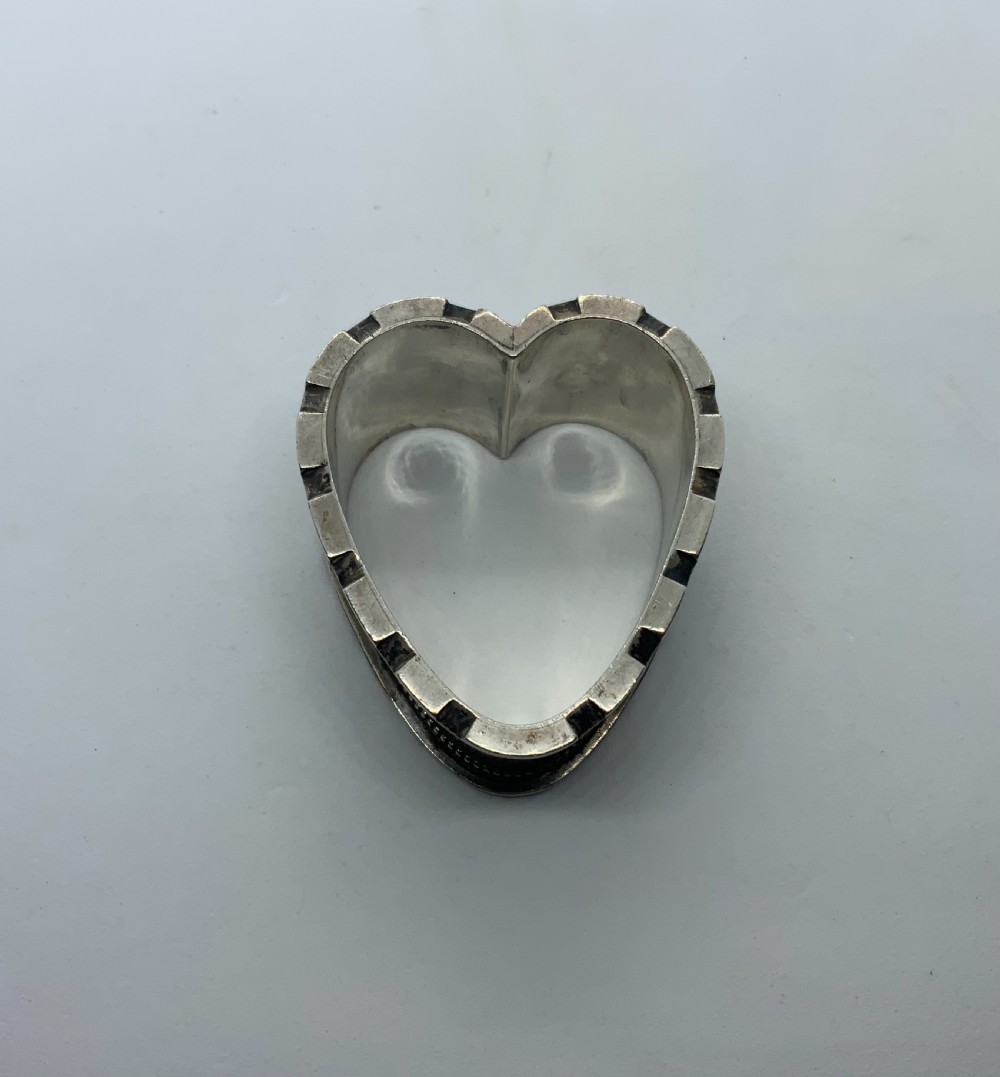 Silver heart shaped napkin ring View IV