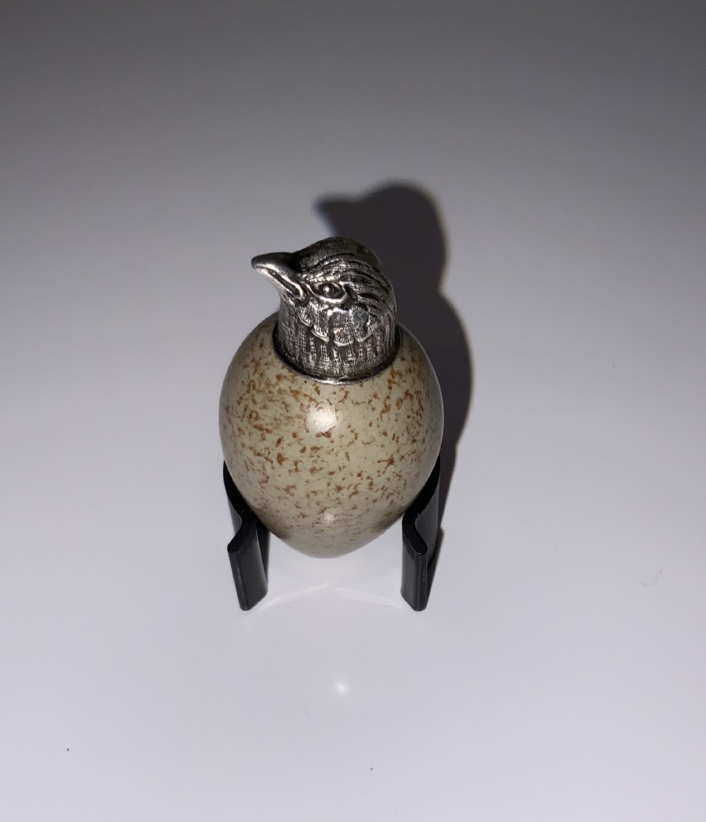 MacIntyre egg scent bottle with birds head top.