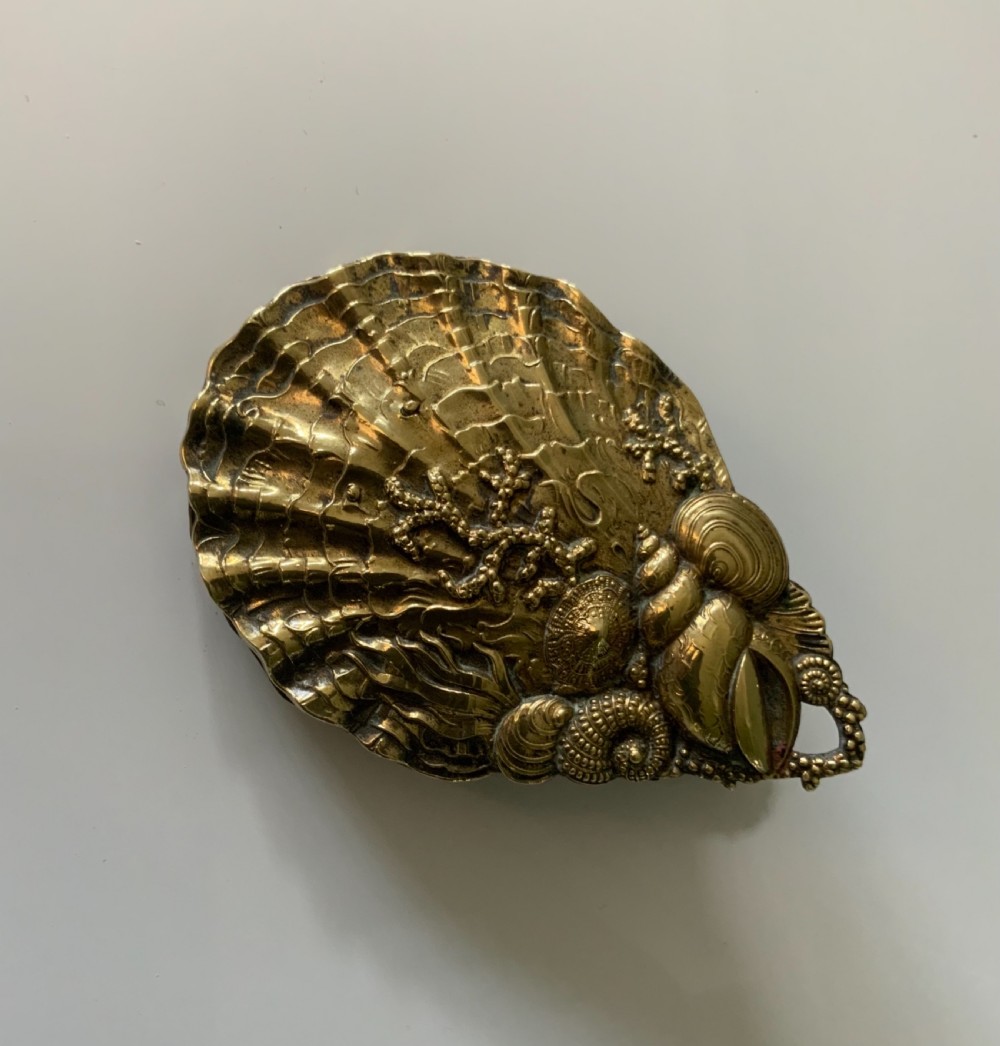 Brass scallop shaped paperclip View III