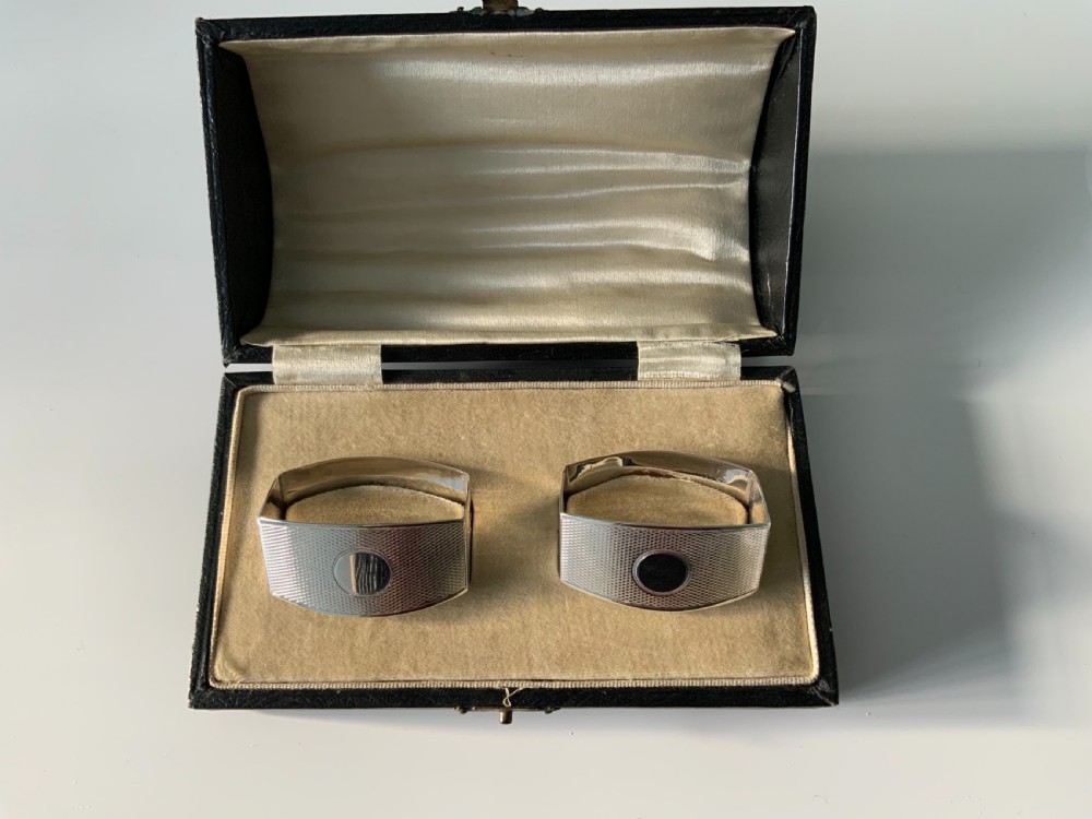 Pair of silver Art Deco napkin rings in original box