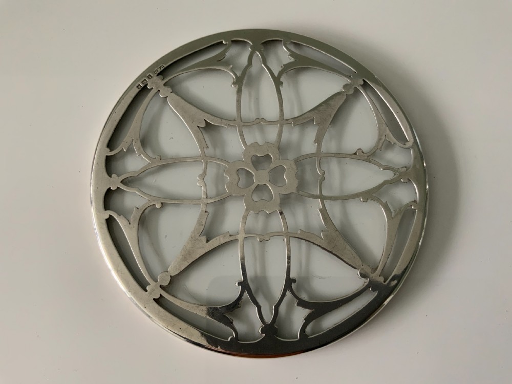 Silver trivet teapot stand
