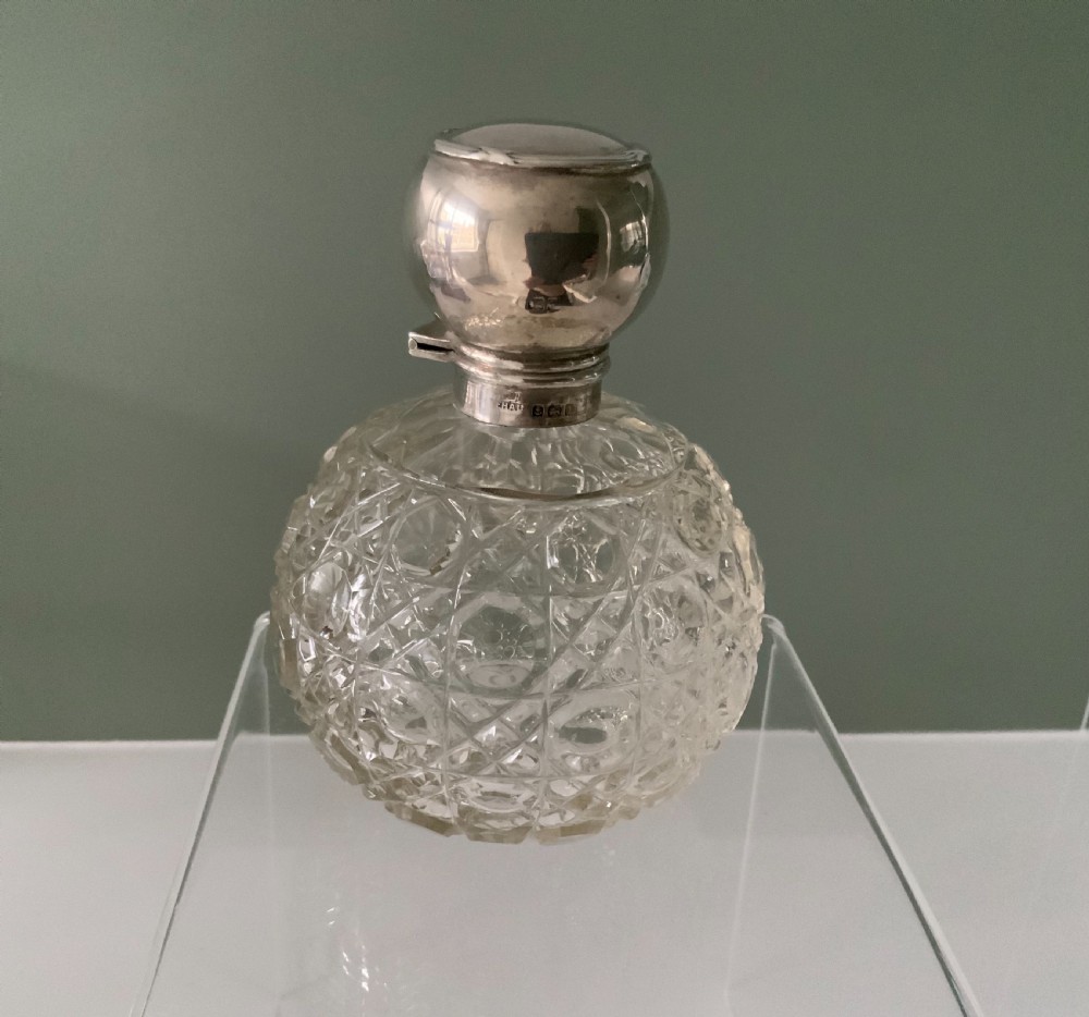 Edwardian silver topped glass scent bottle