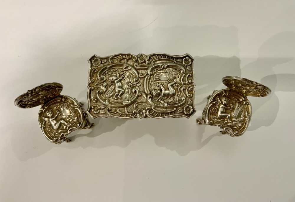 Miniature silver table and chairs View II