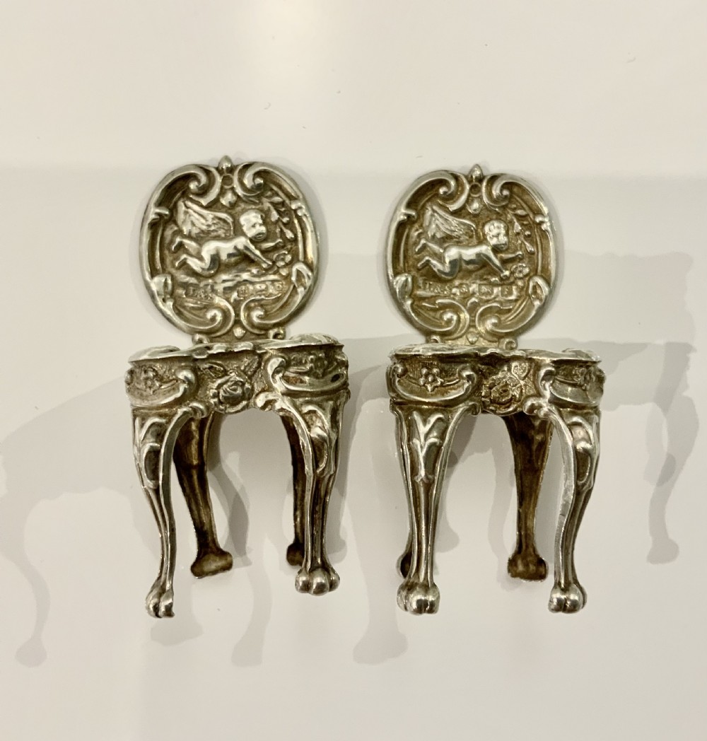 Miniature silver table and chairs View III