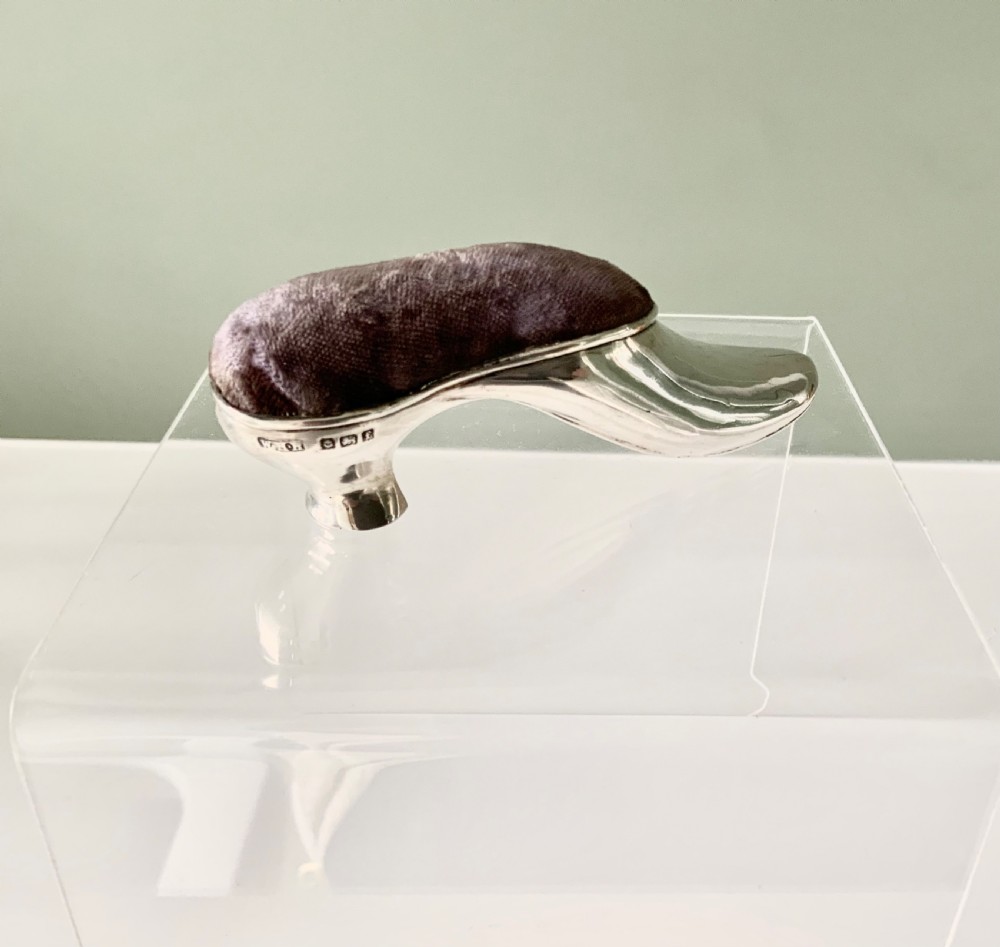 Silver pincushion in the form of a shoe