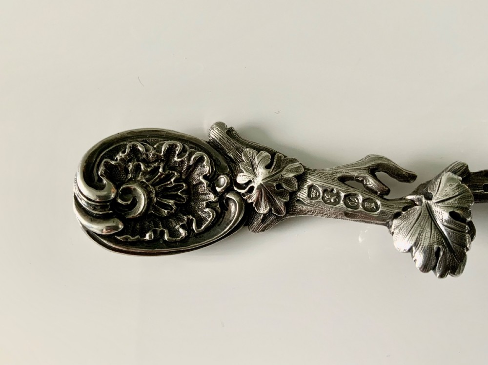 Victorian heavy cast silver naturalistic sifter spoon View III