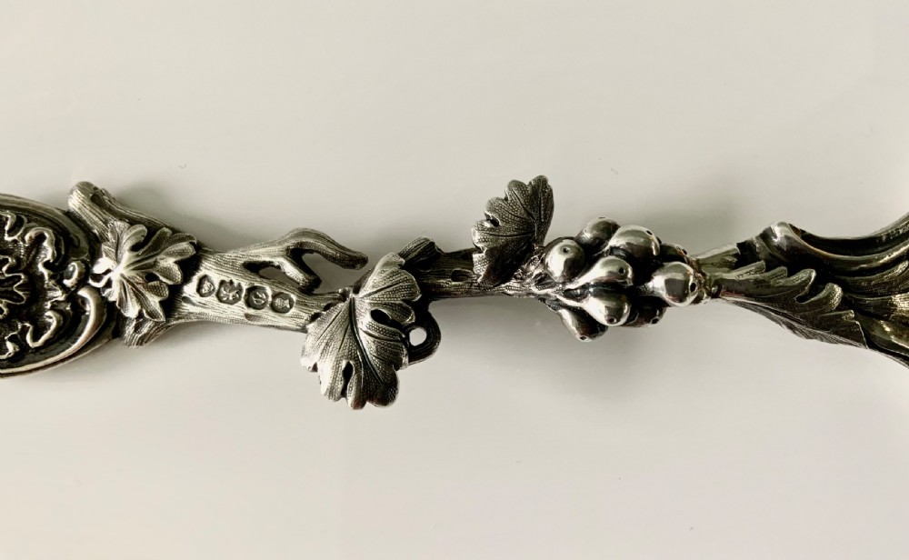 Victorian heavy cast silver naturalistic sifter spoon View IV