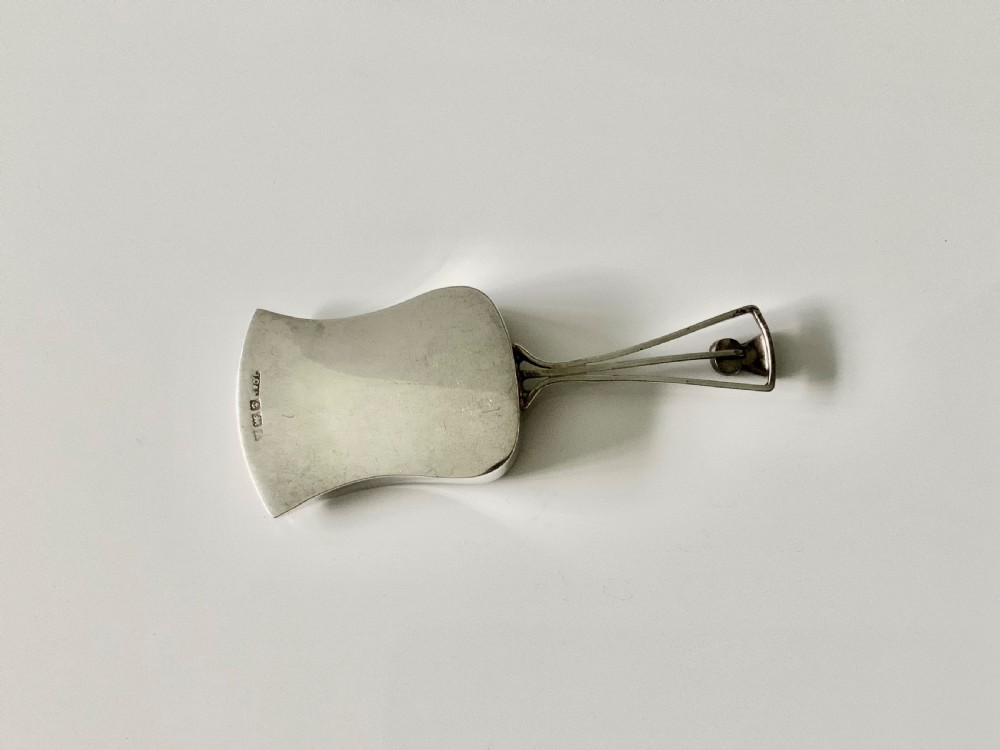 Silver caddy spoon, unusual shape, thistle decoration
 View III