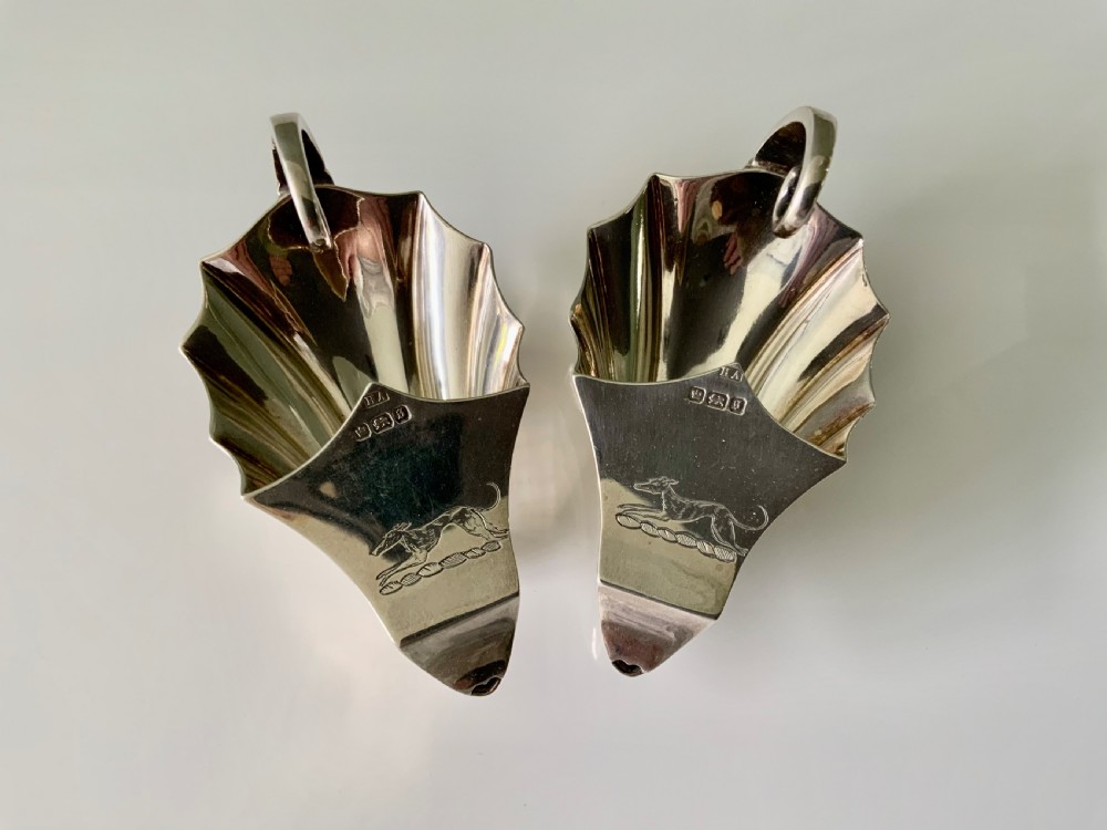 Rare pair of silver salt pourers