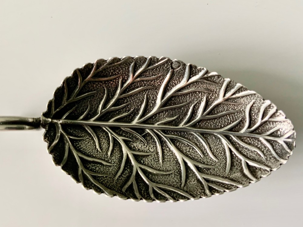 Georgian silver leaf veined caddy spoon View II