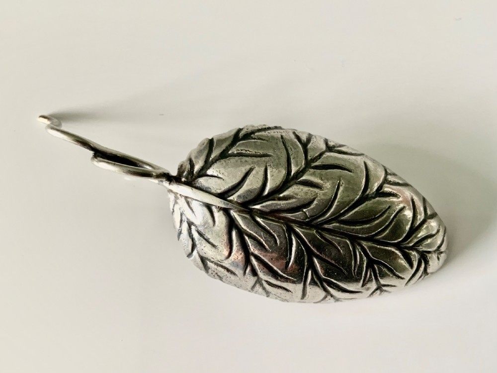 Georgian silver leaf veined caddy spoon View IV
