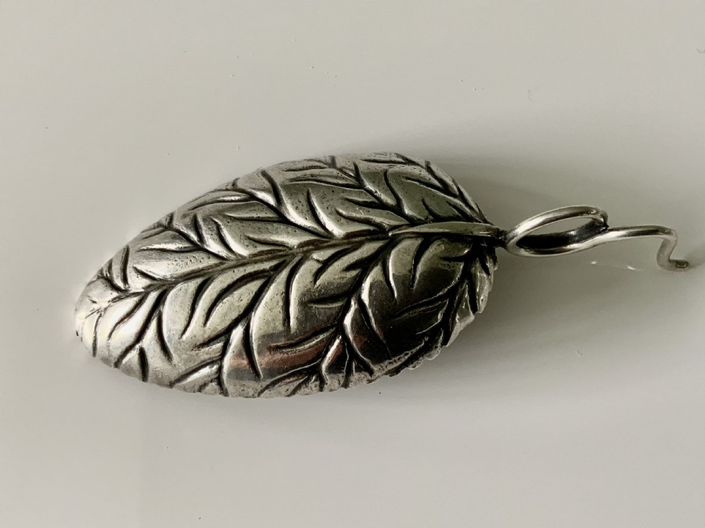 Georgian silver leaf veined caddy spoon View V