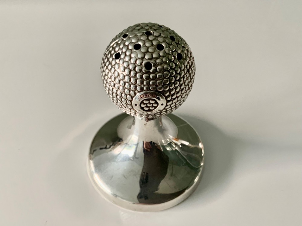 Rare silver hatpin holder in the form of a golf ball