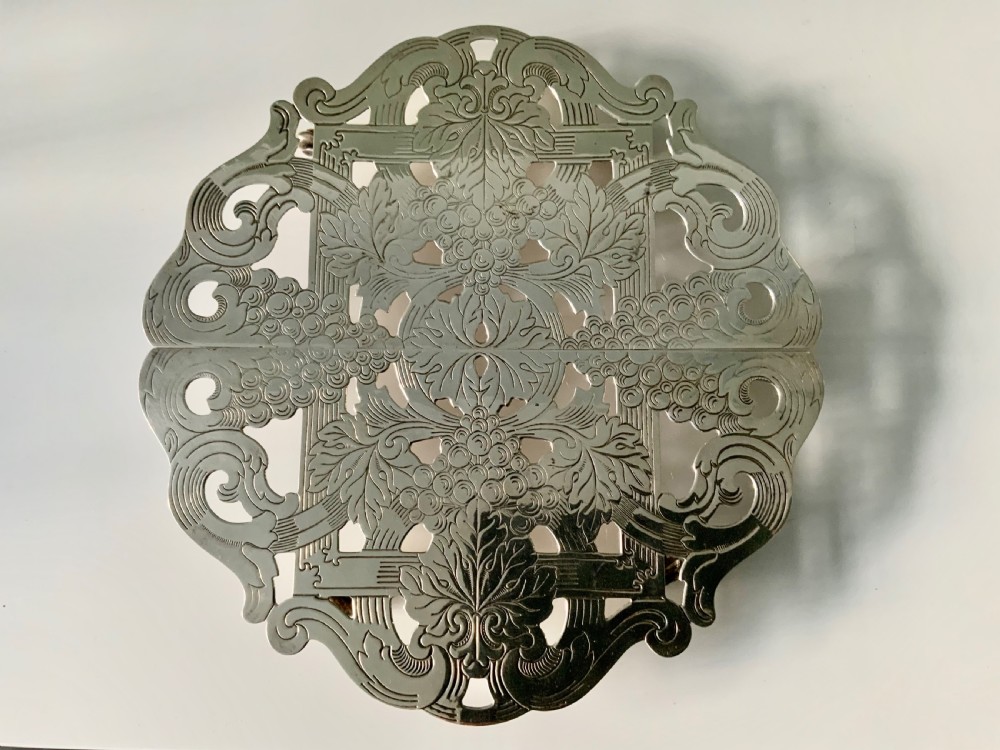 American silver plate trivet - extendable