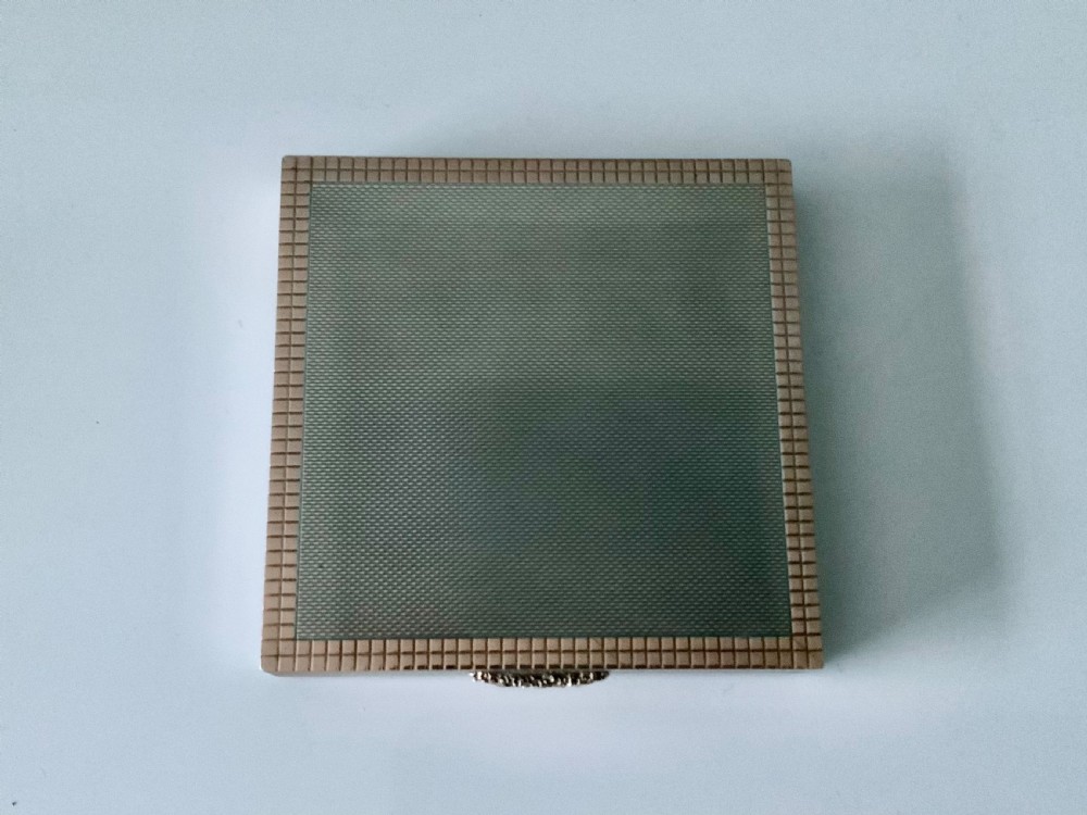 Silver and rose gold compact