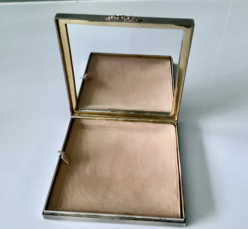 Silver and rose gold compact View IV