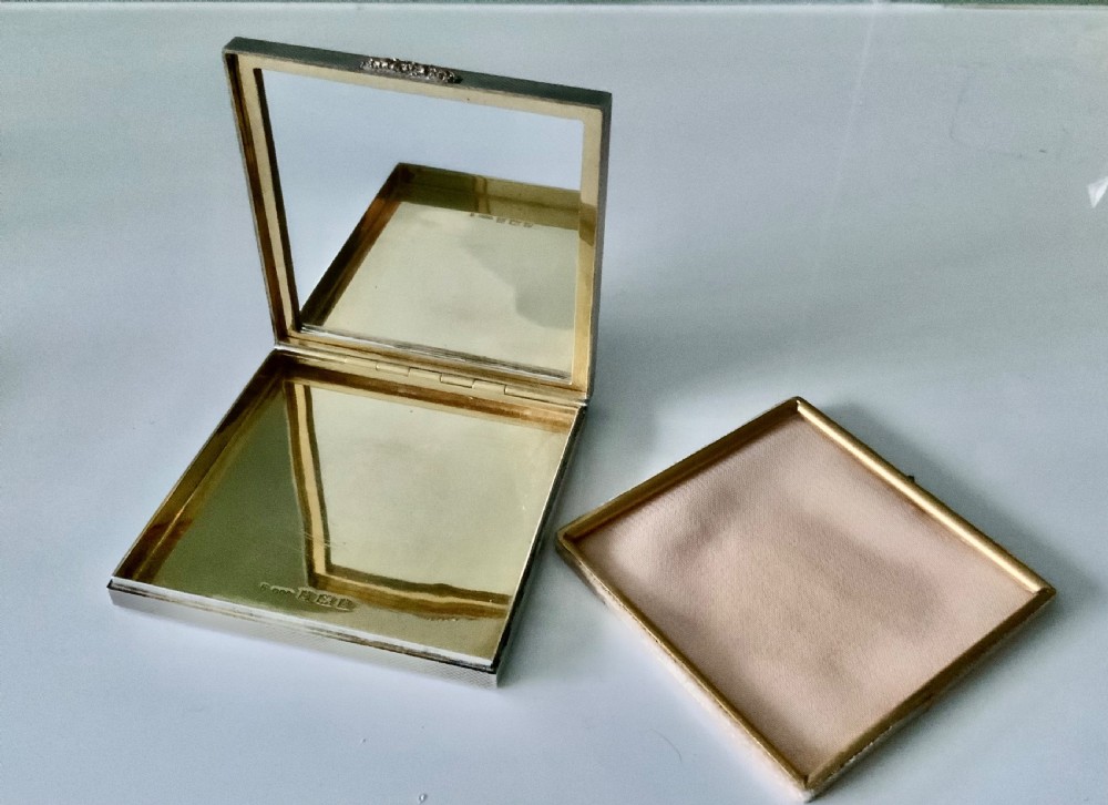 Silver and rose gold compact View V