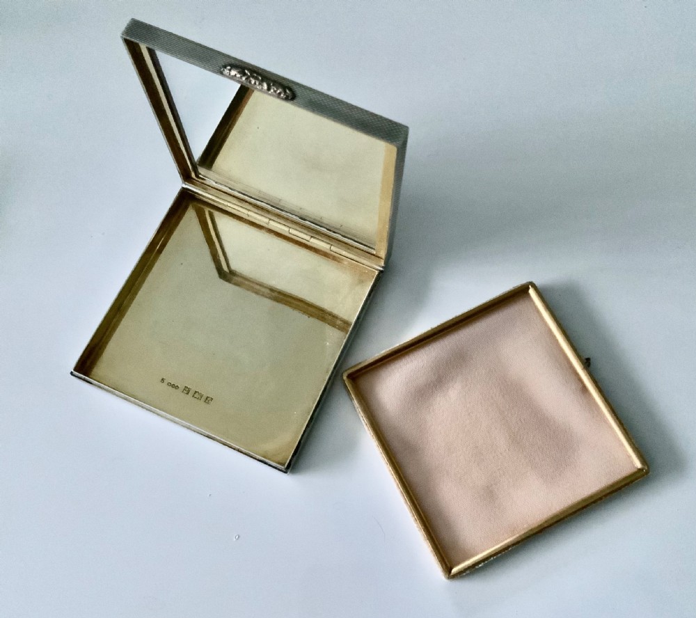 Silver and rose gold compact View VI