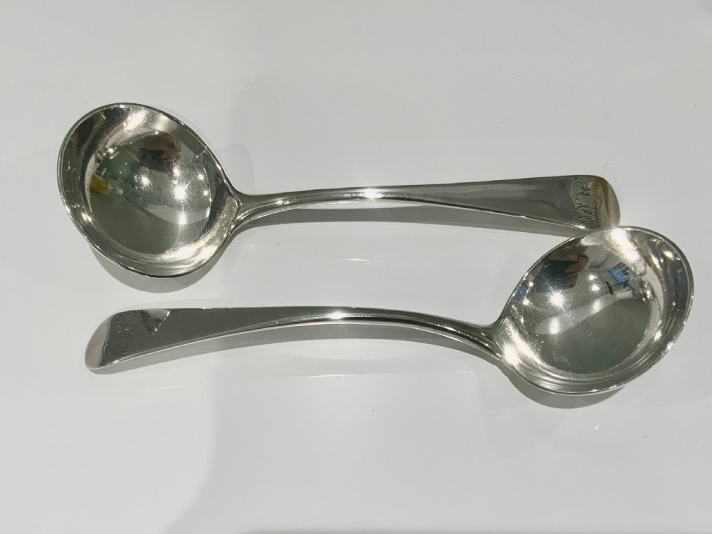 Pair of Hester Bateman silver sauce ladles