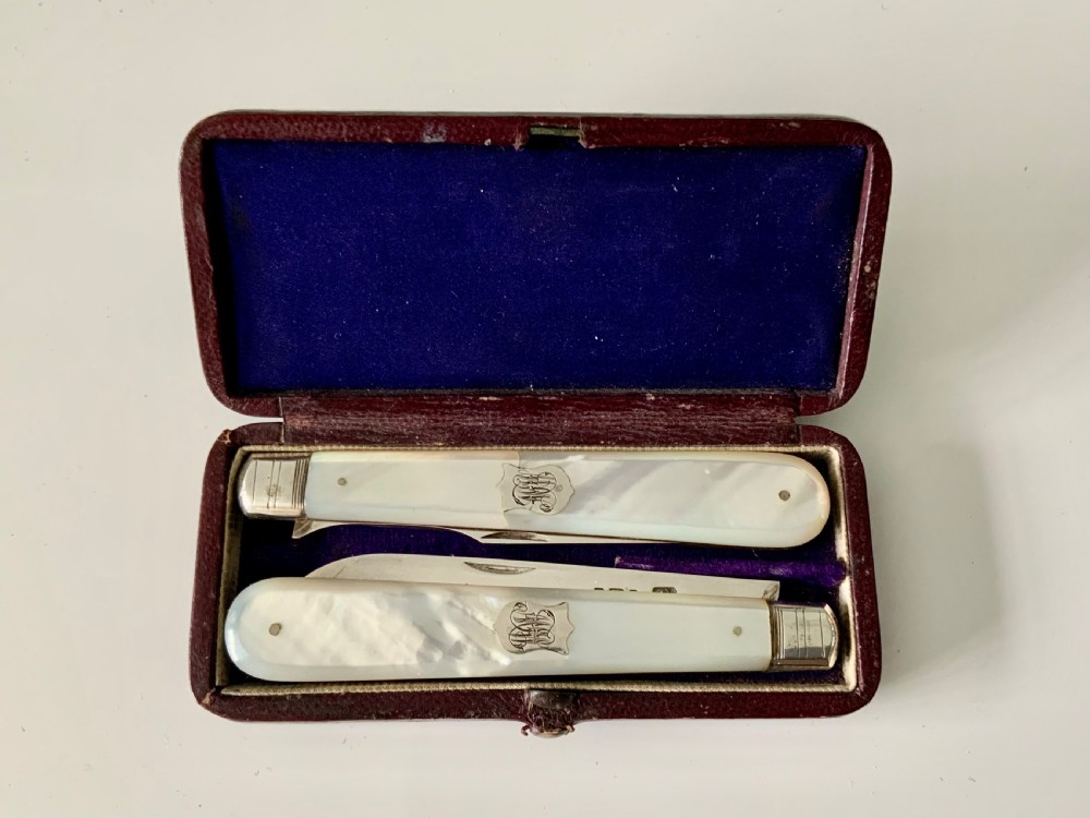 Silver & mother of pearl folding knife and fork
