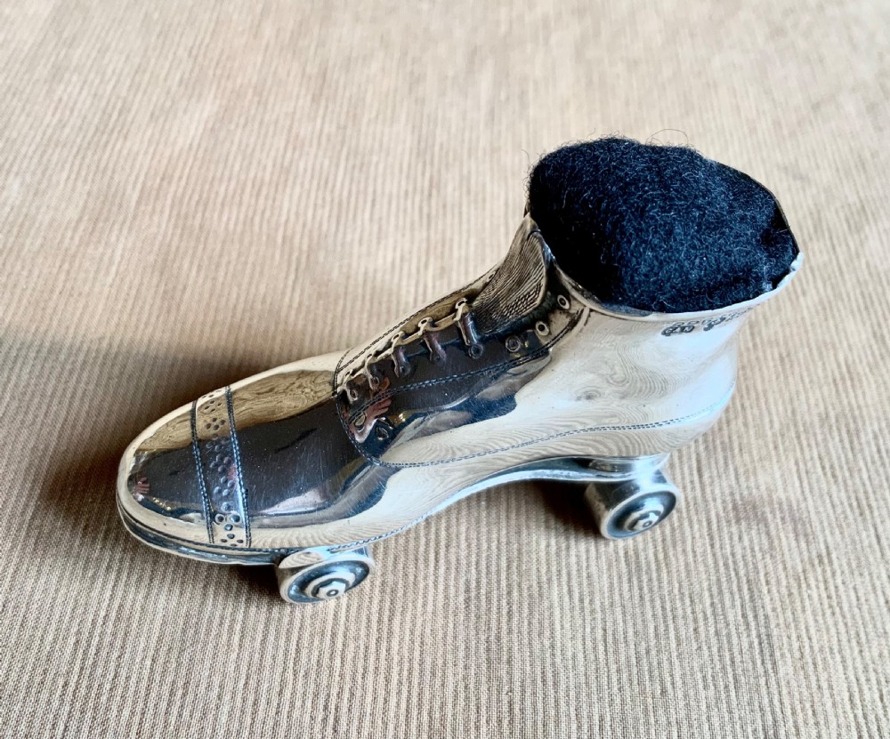 Rare antique rollerskate silver pin cushion