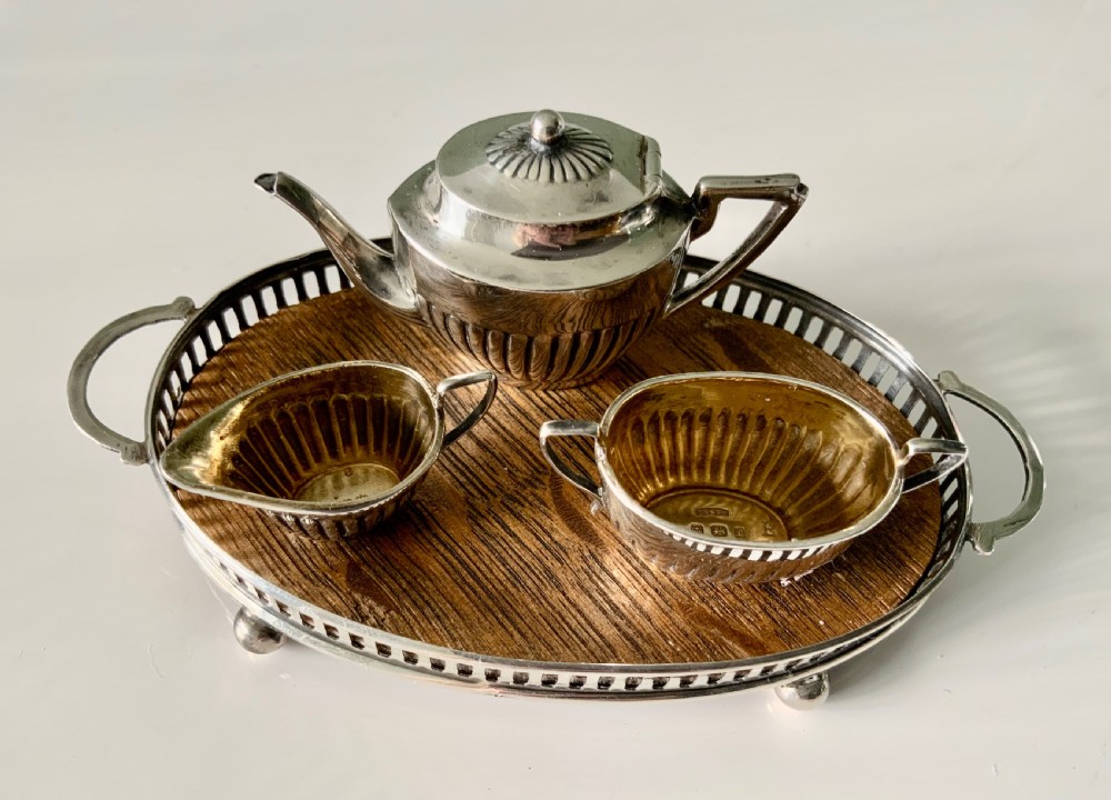Miniature silver tea service and tray