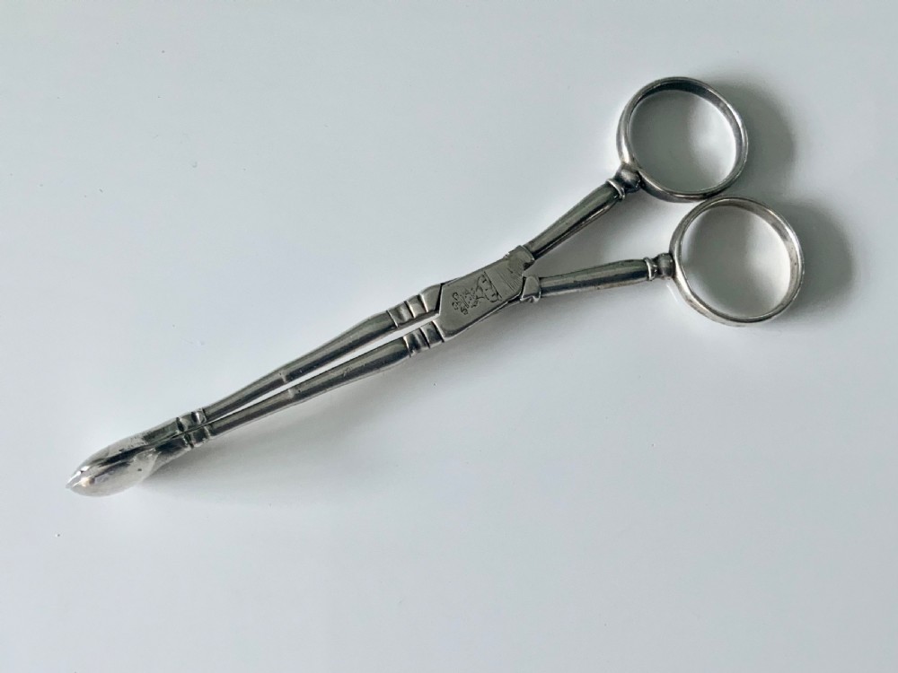 Early Baluster pair of silver tea tongs