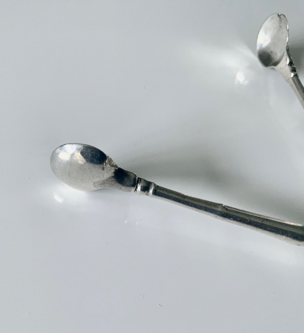 Early Baluster pair of silver tea tongs View VII