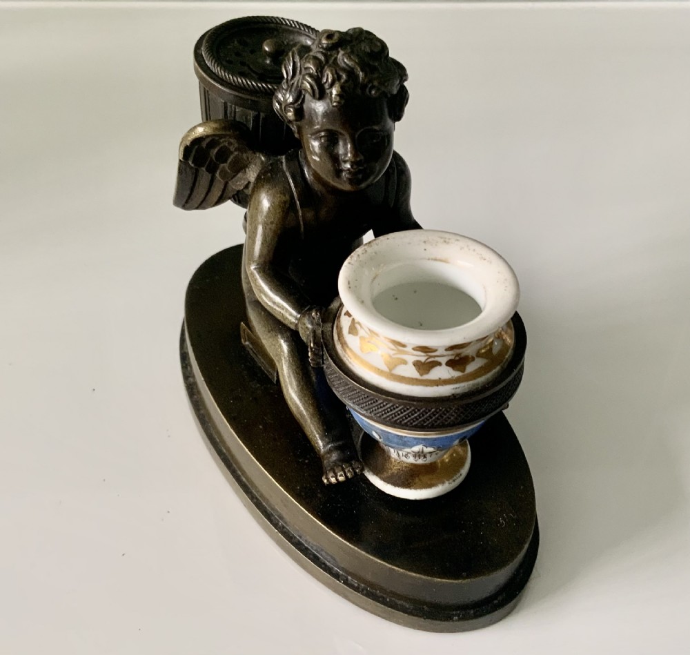 Early 19th century Cupid bronze pounce pot & inkwell