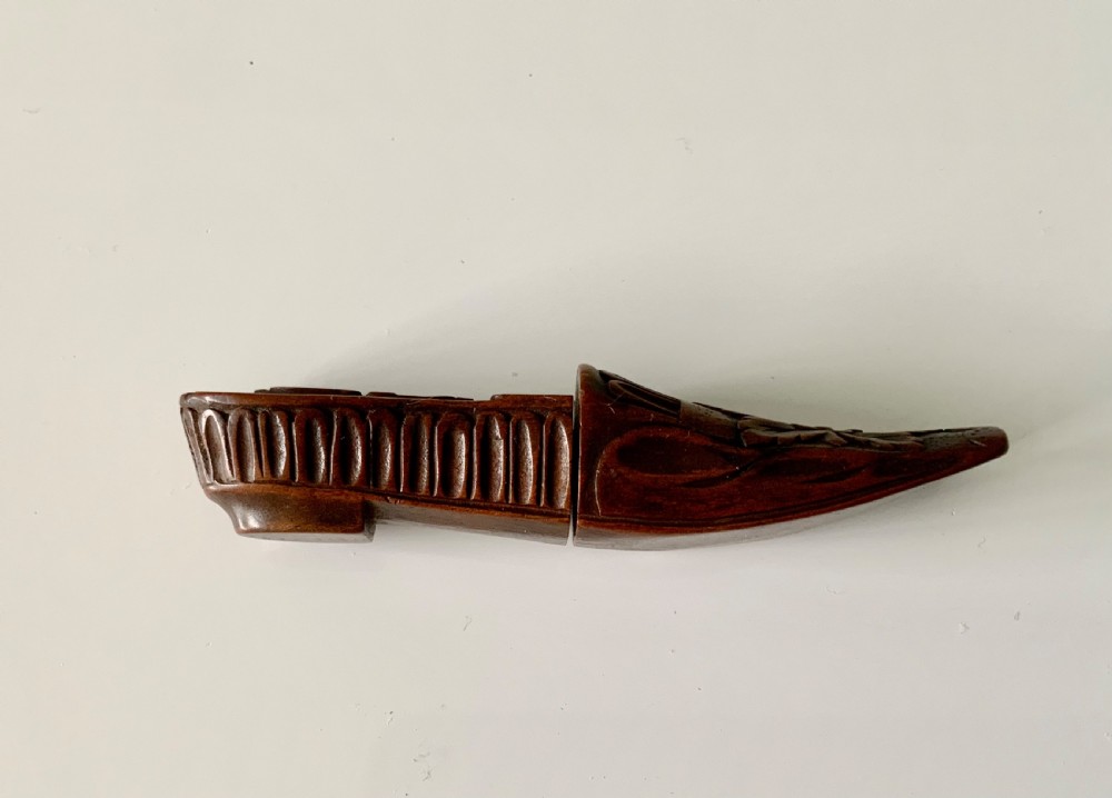 Carved wooden shoe needle case View V