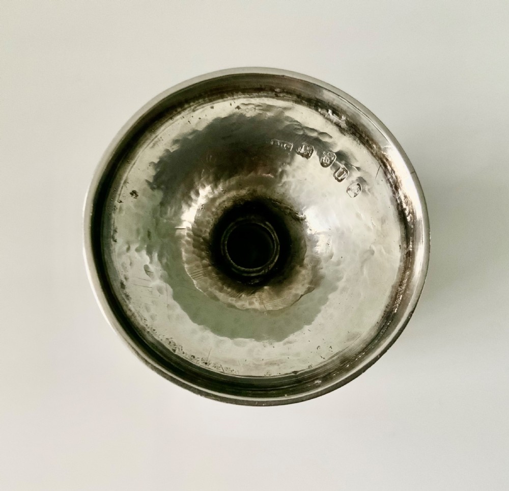 A Georgian silver goblet featuring bright-cut engraved geometric patterns on a circular pedestal foot and rounded bowl. View IV