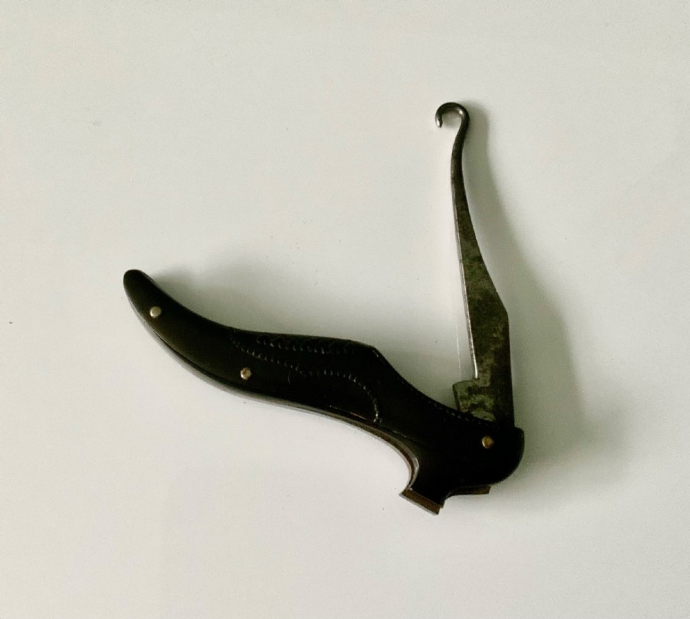 Novelty Bakelite button hook View IV