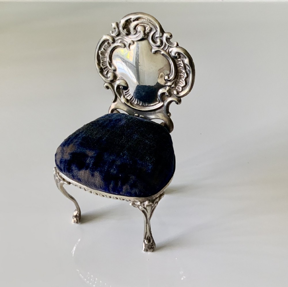 Large silver chair pin cushion