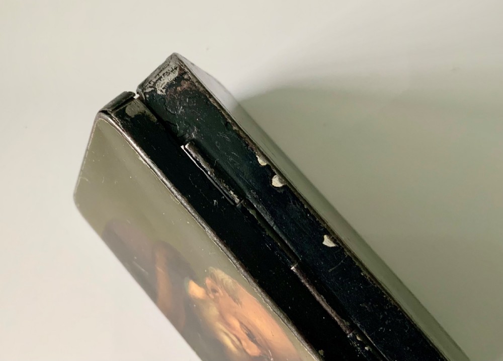 An early 19th-century rectangular painted tin snuff box featuring a hand-painted portrait of a bearded man on the olive green lid. View VI
