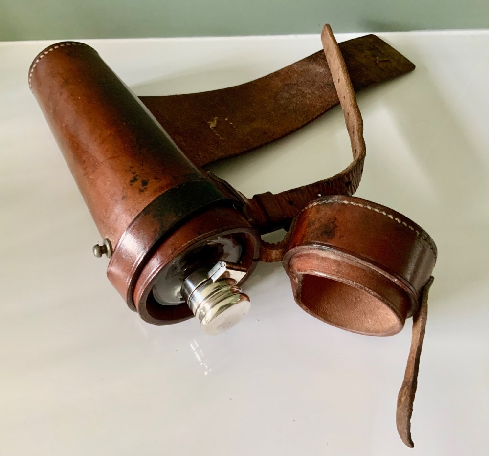 Silver hunting flask in original leather case