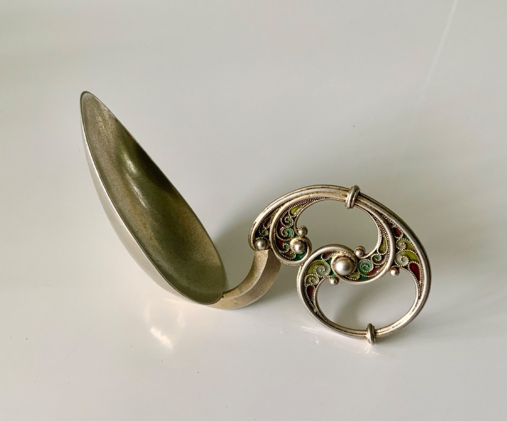 Norwegian silver plique jour caddy spoon.