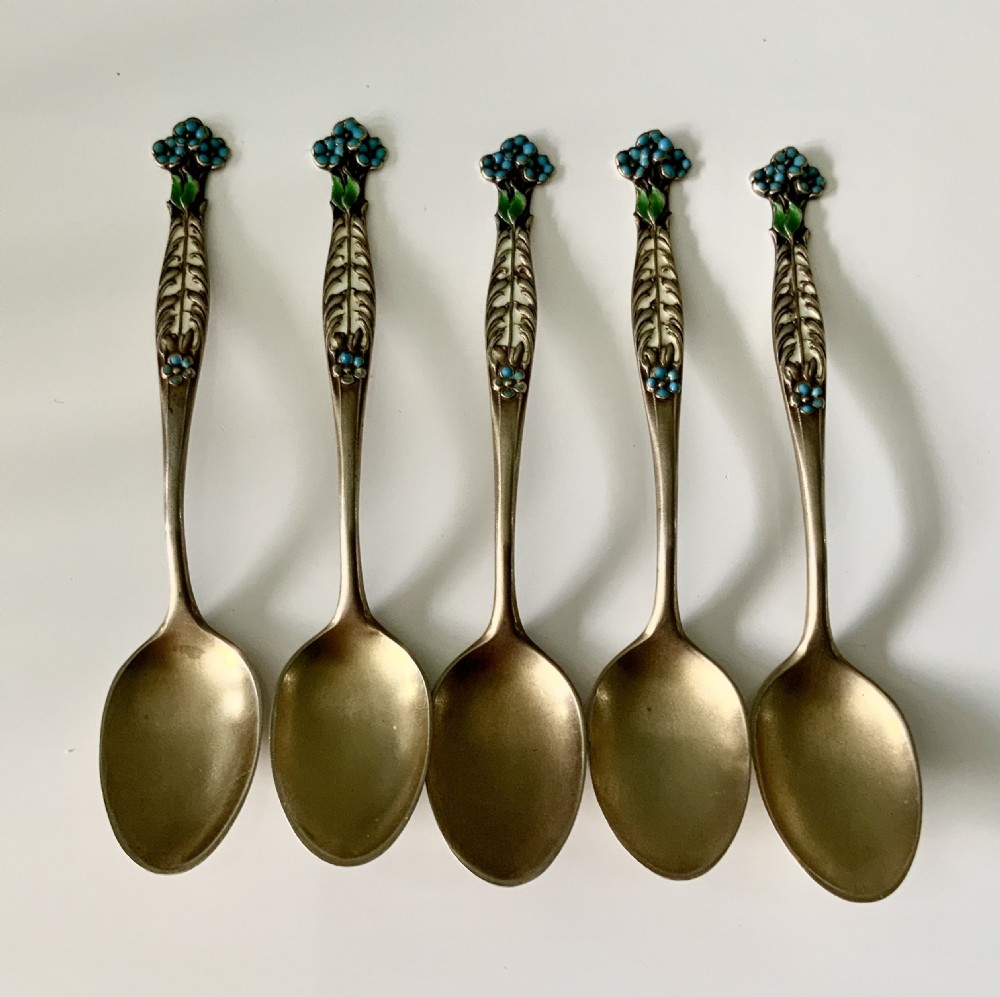 American silver gilt and enamel teaspoons