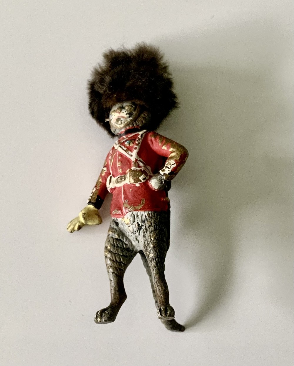 Cold painted bronze cat dressed as a Grenadier Guard