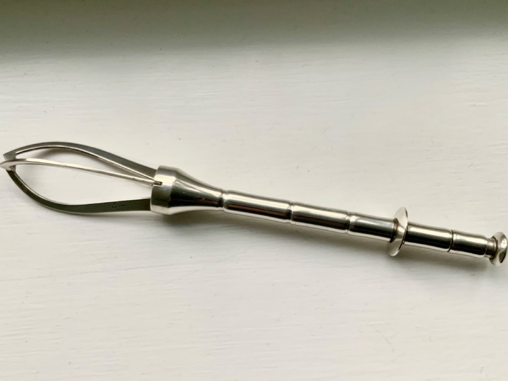 Mid century silver ice tongs View II