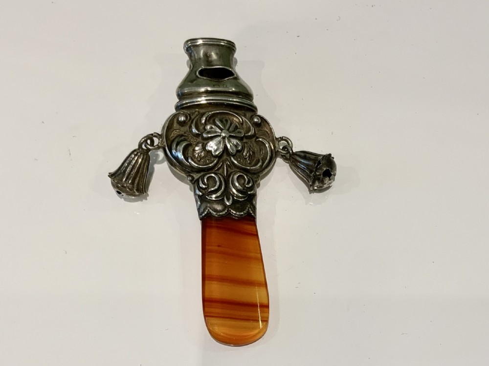 Silver rattle with agate handle