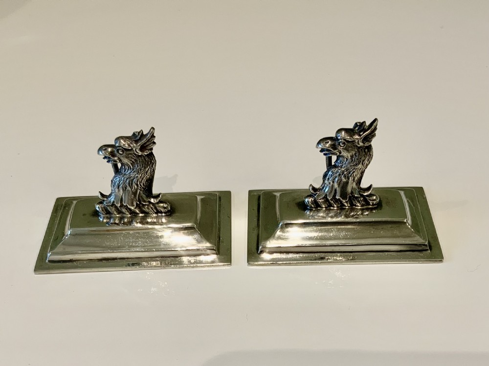 Heraldic silver menu holders