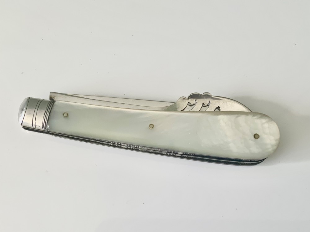 Edwardian silver & MOP combined folding fruit knife and patented orange peeler View III