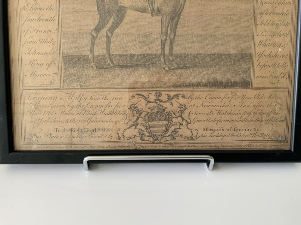 A framed 18th-century copperplate engraving depicting the racehorse Creeping Molly alongside jockey, detailed text panels, and a heraldic coat of arms. View II