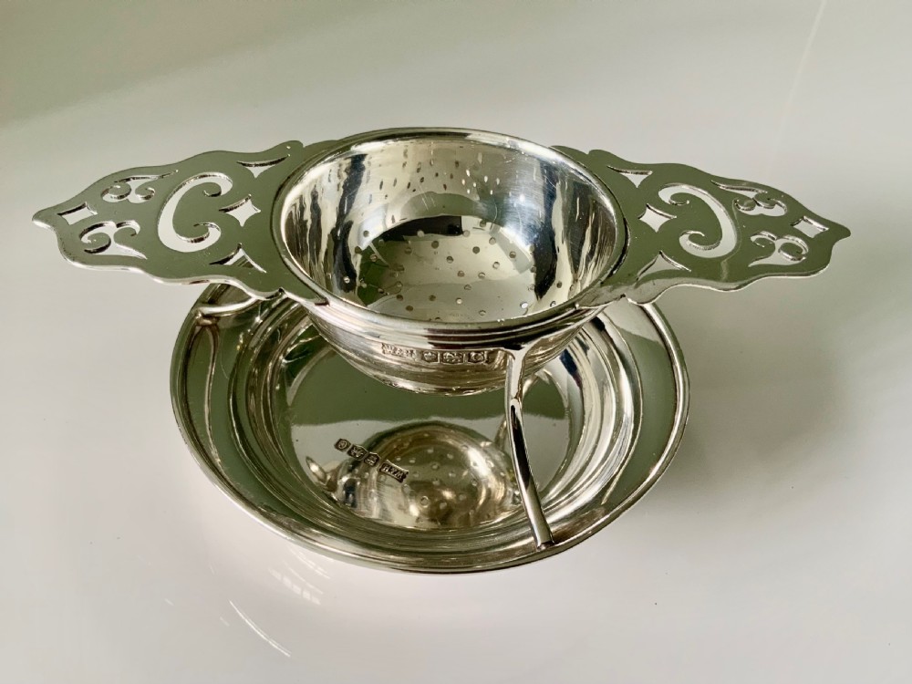 Silver tea strainer & stand Walker & Hall