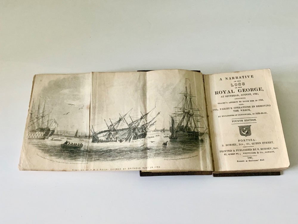 An open nineteenth-century book showing an engraved frontispiece illustration of a ship sinking on the left and a printed title page titled A Narrative of the Loss of the Royal George on the right. View III