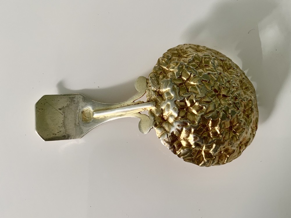 Unmarked silver gilt Georgian caddy spoon View II