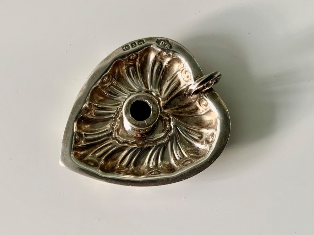 Miniature silver heart shaped go to bed
